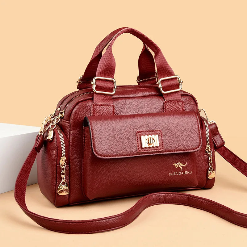 Luxury designer shoulder bag and clutch by Corporación Turística, stylish purple accessories for elegant fashion.