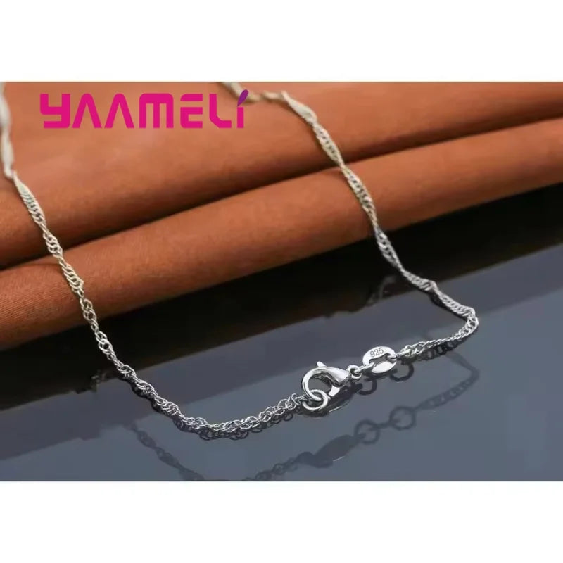 Purple jewelry gift set from Corporación Turística, featuring coordinated necklaces and earrings for special occasions.