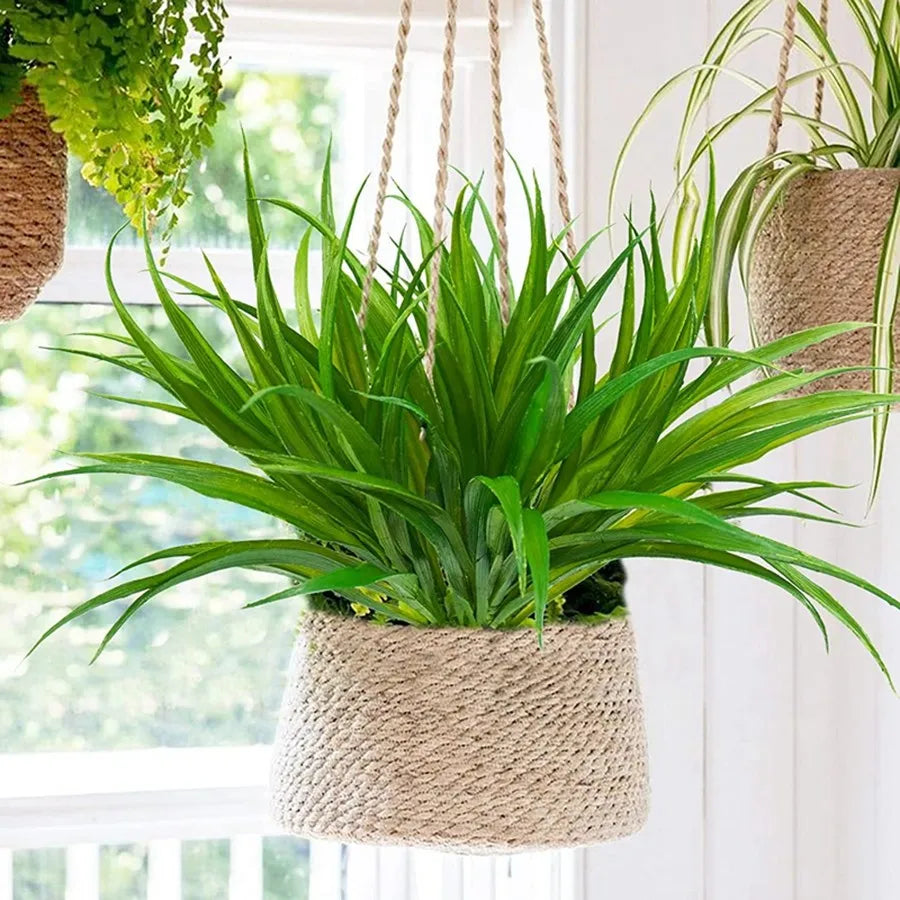 Artificial Rama with 14 spring leaves for decoration, from Corporación Turística, suitable for creating floral arrangements or wreaths.