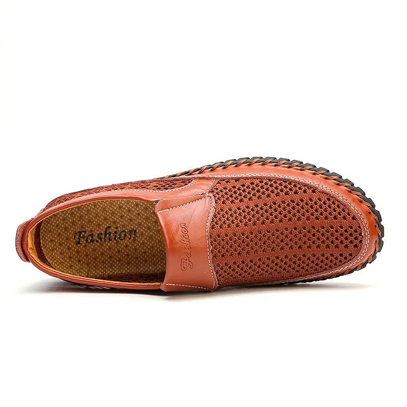 Brown genuine leather men's sports sneakers by Corporación Turística, featuring a comfortable athletic design and durable construction.