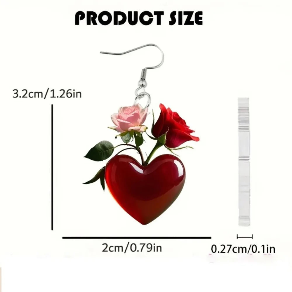 Acrylic heart-shaped dangling earrings from Corporación Turística, featuring vibrant red design and lightweight style.