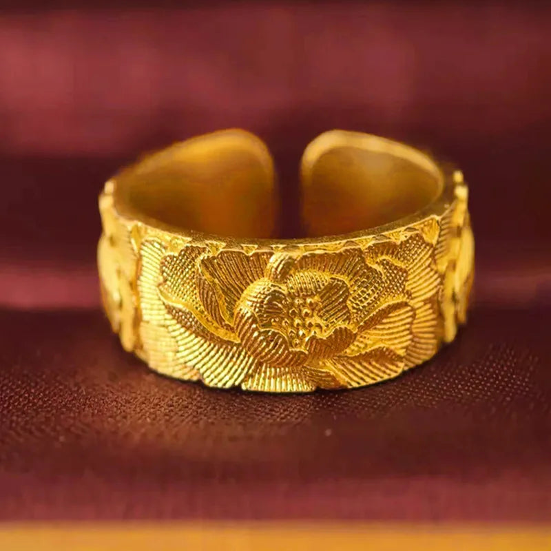 Open peony relief ring for women by Corporación Turística, featuring intricate floral design on adjustable band.