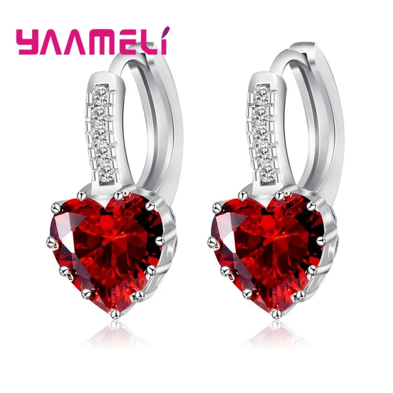 Red circular cubic zirconia hoop earrings for women by YAAMELI, showcasing sparkling jewelry with a shiny finish.