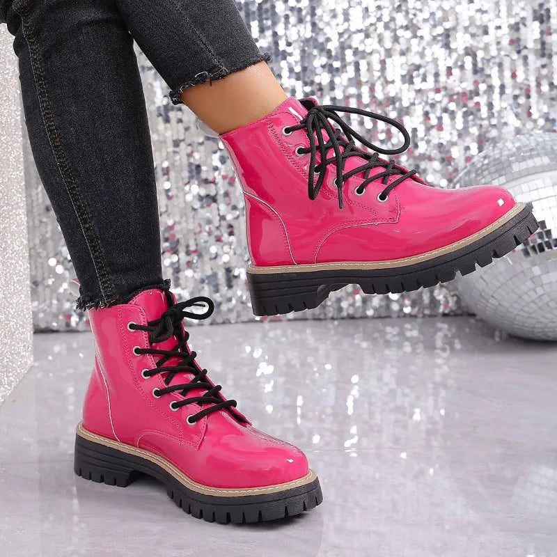 Red platform combat boots with lace-up design by Corporación Turística, new shiny patent leather ankle boots.