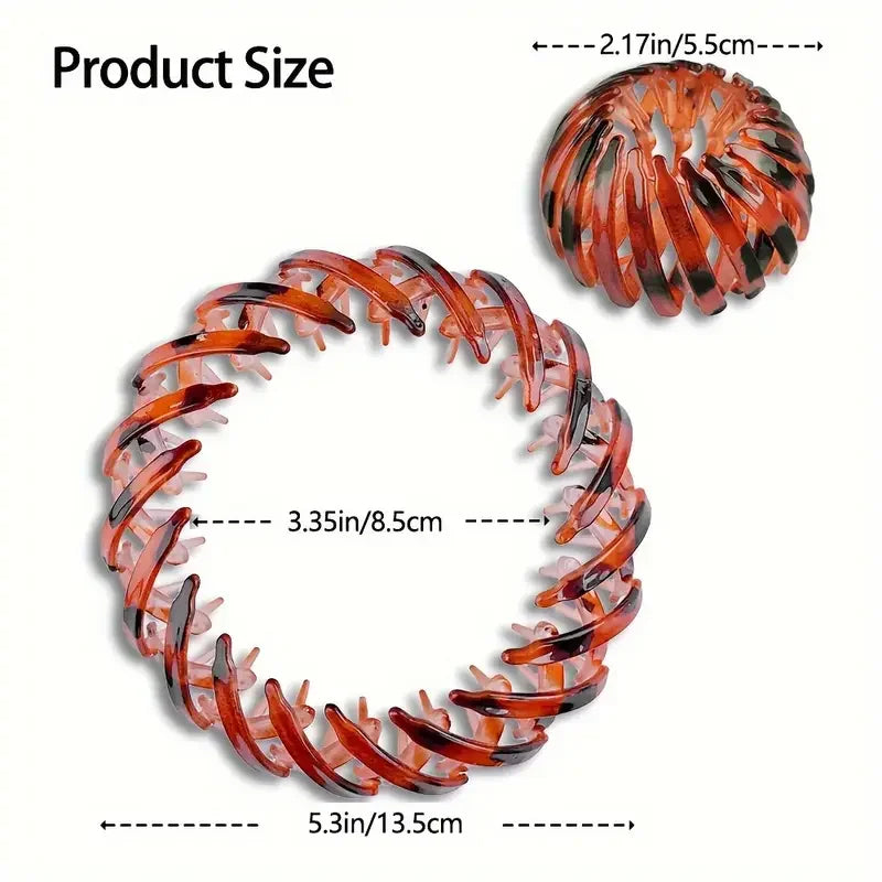Red fashion bird's nest hair clip by Corporación Turística, stylish accessory for securing hair in a natural, elegant style.