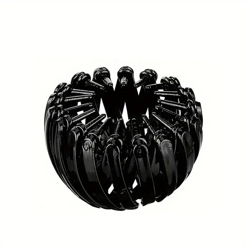 Fashionable bird's nest-shaped hair clip by Corporación Turística, vibrant red, stylish accessory for hair styling.