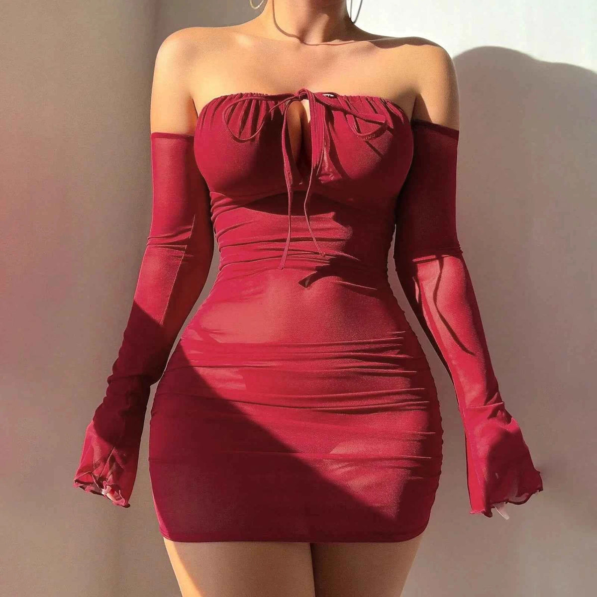Transparent red erotic camisón for women, lace lingerie without straps, by Corporación Turística, showcasing a seductive, sheer design.