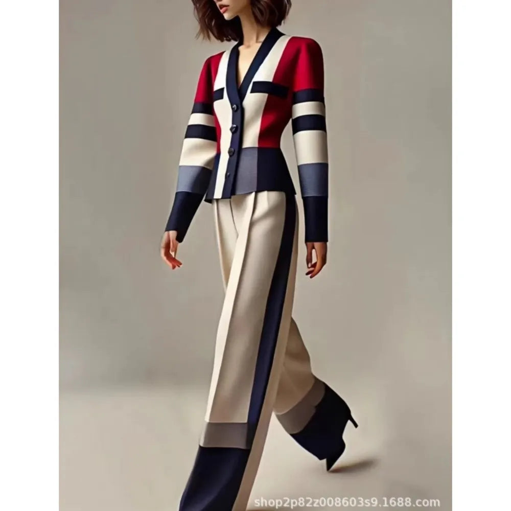 Elegant red women's two-piece blazer set featuring a tailored blazer and matching bottom by Corporación Turística.