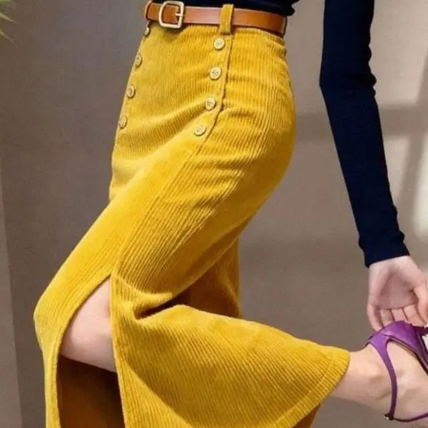 Long purple corduroy skirt for women, French style, by Corporación Turística, shown in the image with a flowing design.