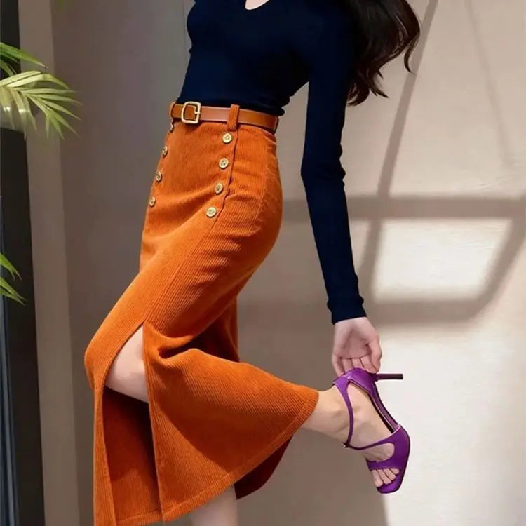Long purple corduroy skirt for women, French style, by Corporación Turística, shown in a full-length view.