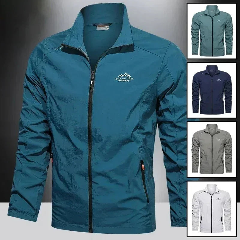 Men's ultralight UV-protective denim blue windbreaker jacket with pockets from Corporación Turística, perfect for summer outdoor activities.