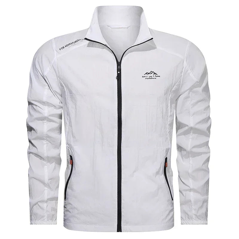 Blue men's UPF100+ summer windbreaker jacket with pockets, lightweight UV protection from Corporación Turística, outdoors apparel.