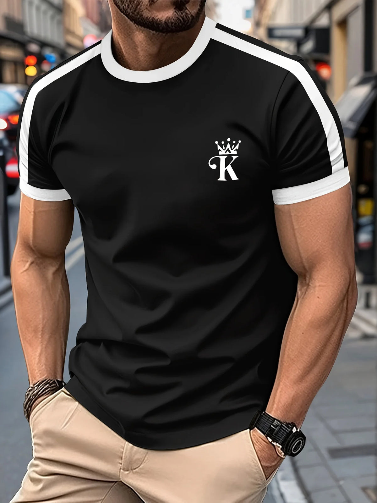 Black men's T-shirt "King" by Corporación Turística with gold printed design, casual style, short sleeves, and crew neck.
