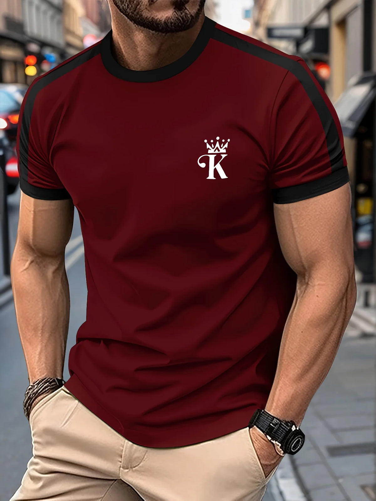 Black men's "King" T-shirt by Corporación Turística with gold print, casual style, short sleeves, and crew neck.