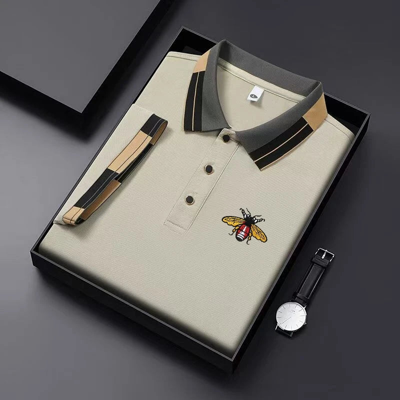 Men's breathable polo shirt by Corporación Turística with embroidered details, short sleeves, perfect for casual summer wear.