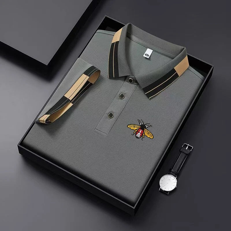 Breathable men's embroidered polo shirt by Corporación Turística, short-sleeve casual summer polo in vibrant fabric.
