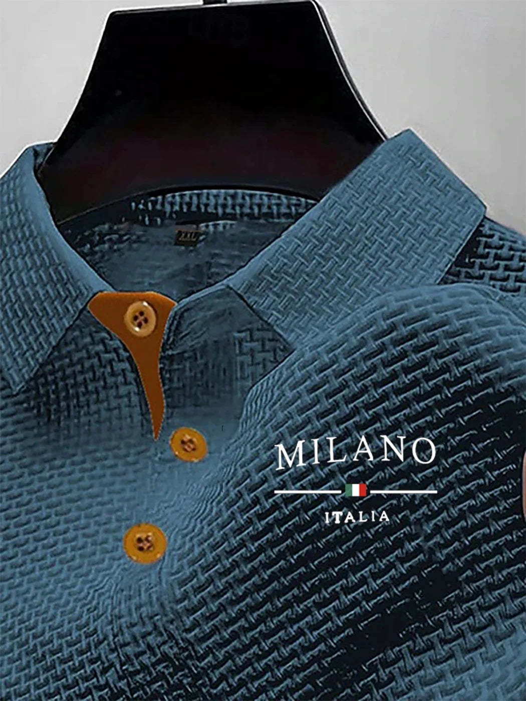 Light blue men's short-sleeve polo shirt by Corporación Turística, casual summer style, basic and comfortable for warm weather.