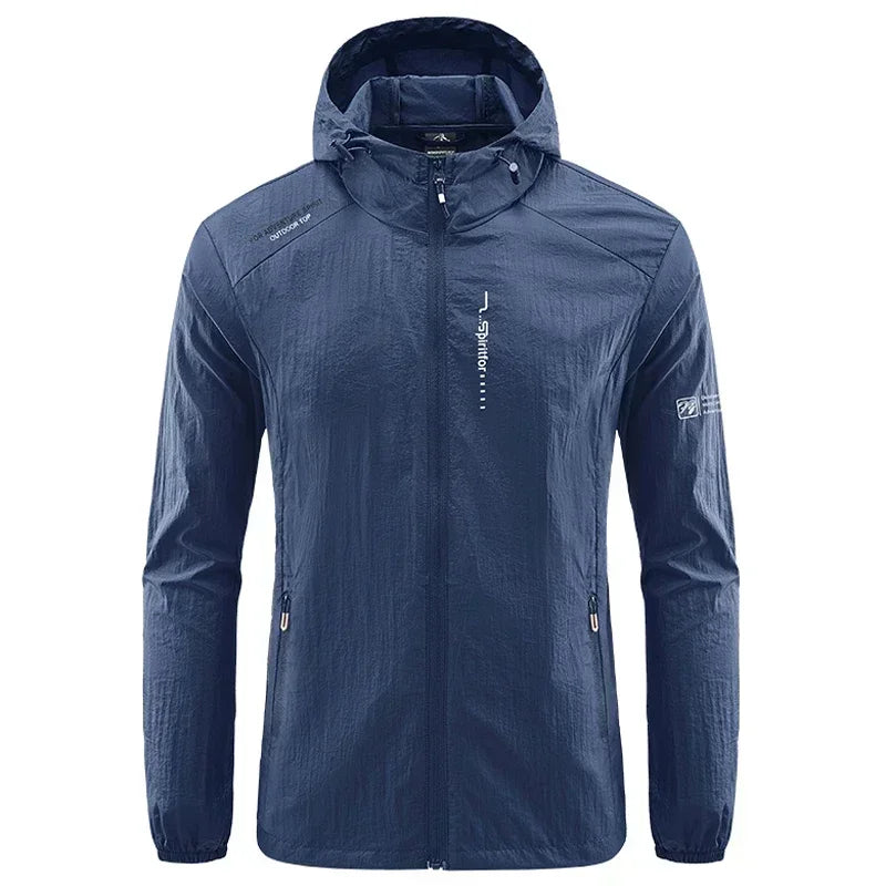 Light grey men's UPF50+ quick-dry sports jacket by Corporación Turística, ideal for hiking and cycling, shown on a model.