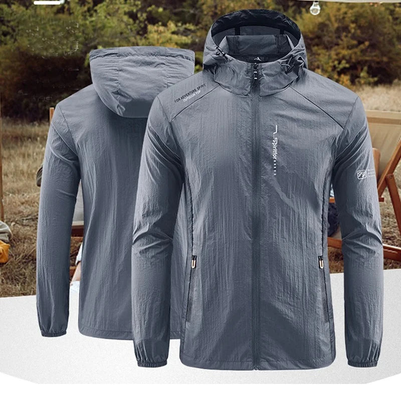 Light grey men's UPF50+ quick-dry sports jacket from Corporación Turística, ideal for hiking and cycling activities.