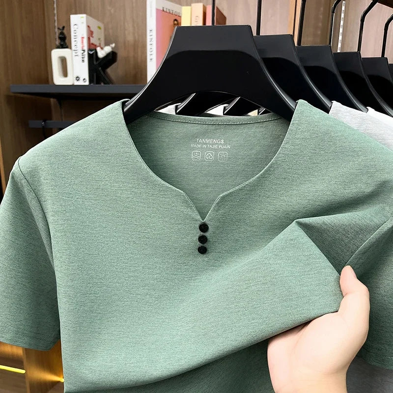 White men's Henley short-sleeve cotton T-shirt from Corporación Turística, casual summer style, breathable and comfortable.