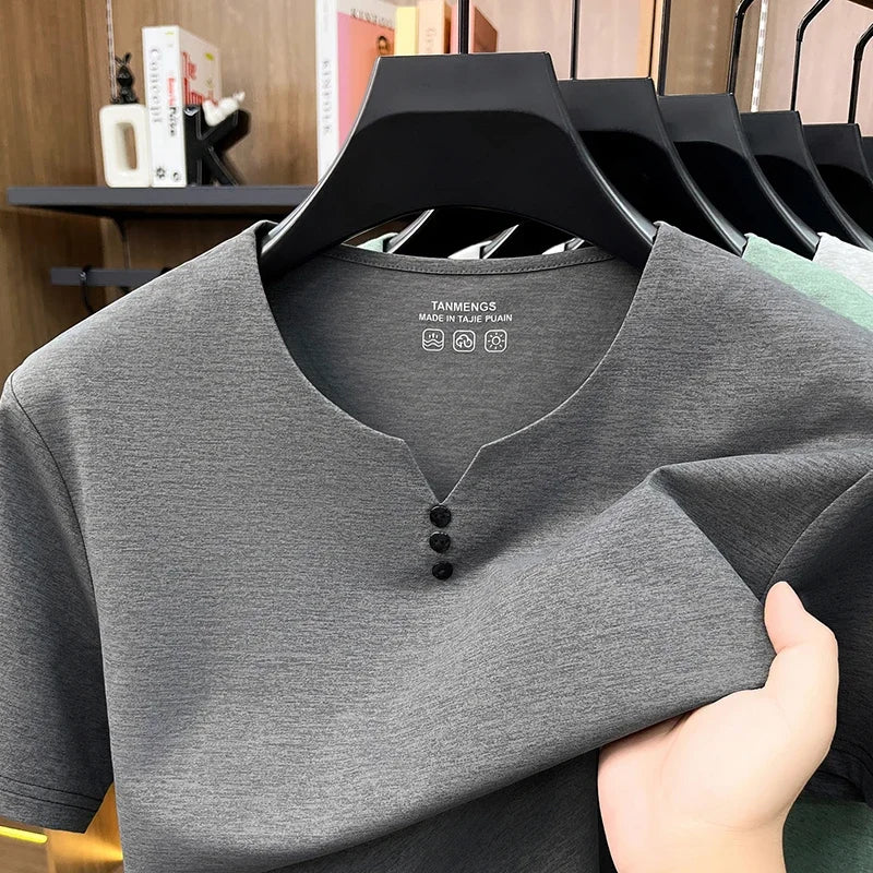 White men's Henley summer casual T-shirt with short sleeves, breathable cotton fabric, by Corporación Turística.