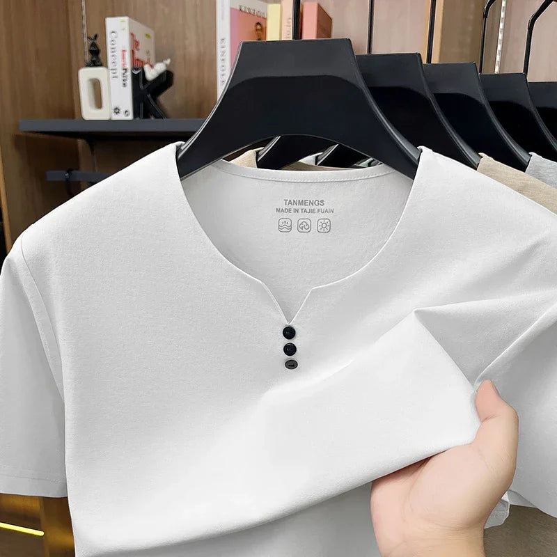 White men's Henley T-shirt from Corporación Turística, breathable cotton, casual summer short sleeve shirt, front view.