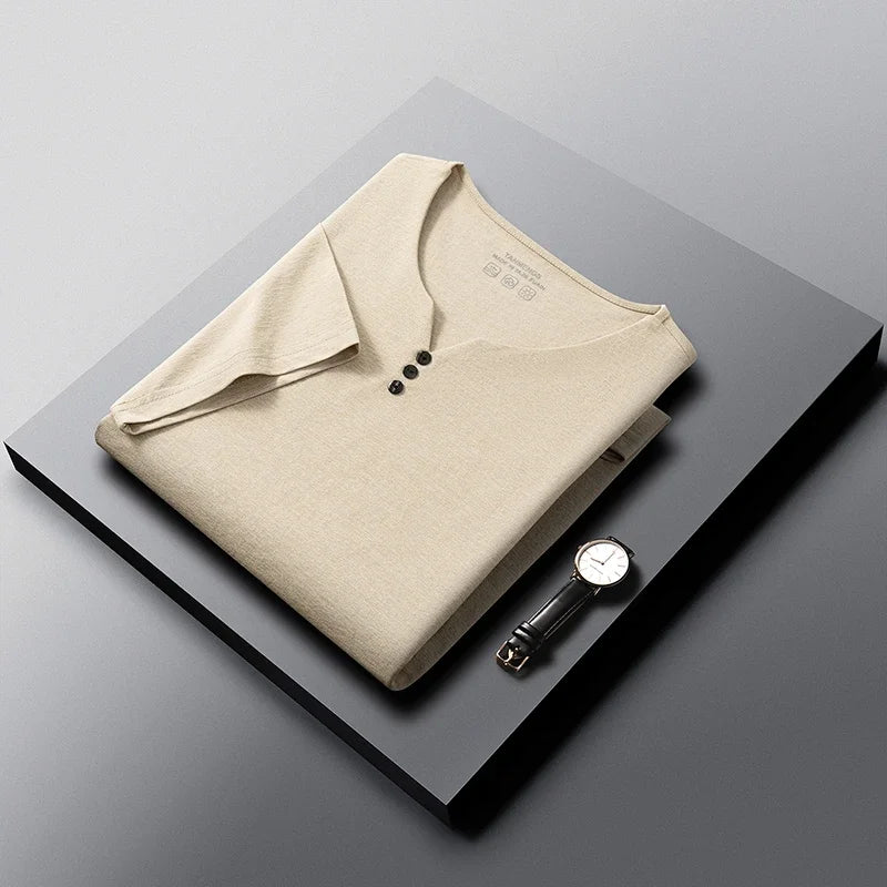 White men's Henley shirt from Corporación Turística, casual summer short sleeve cotton tee, breathable and comfortable for warm weather.