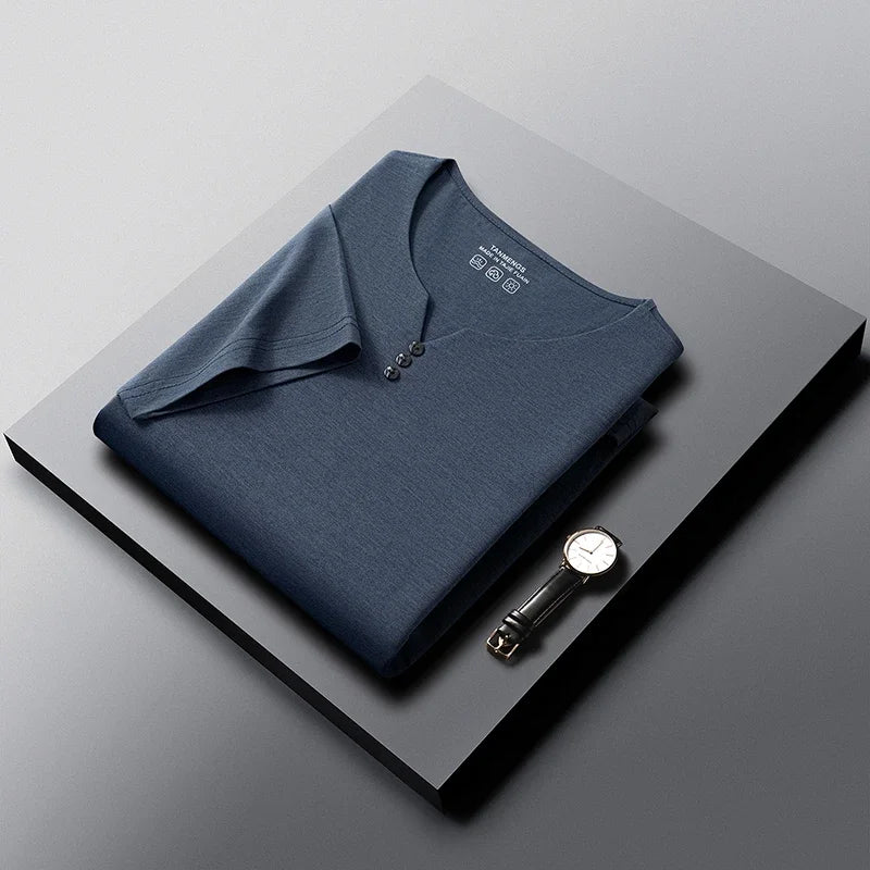 White men's Henley t-shirt by Corporación Turística, short-sleeve, breathable cotton, perfect for summer casual wear.