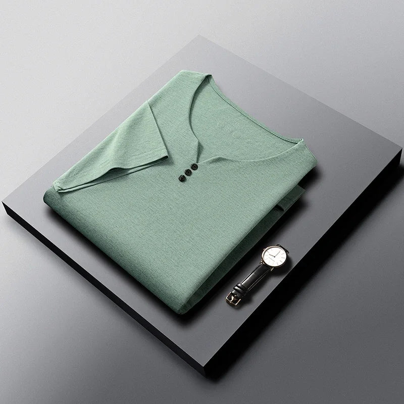 White men's Henley T-shirt by Corporación Turística, short-sleeve, breathable cotton, casual summer clothing for men.