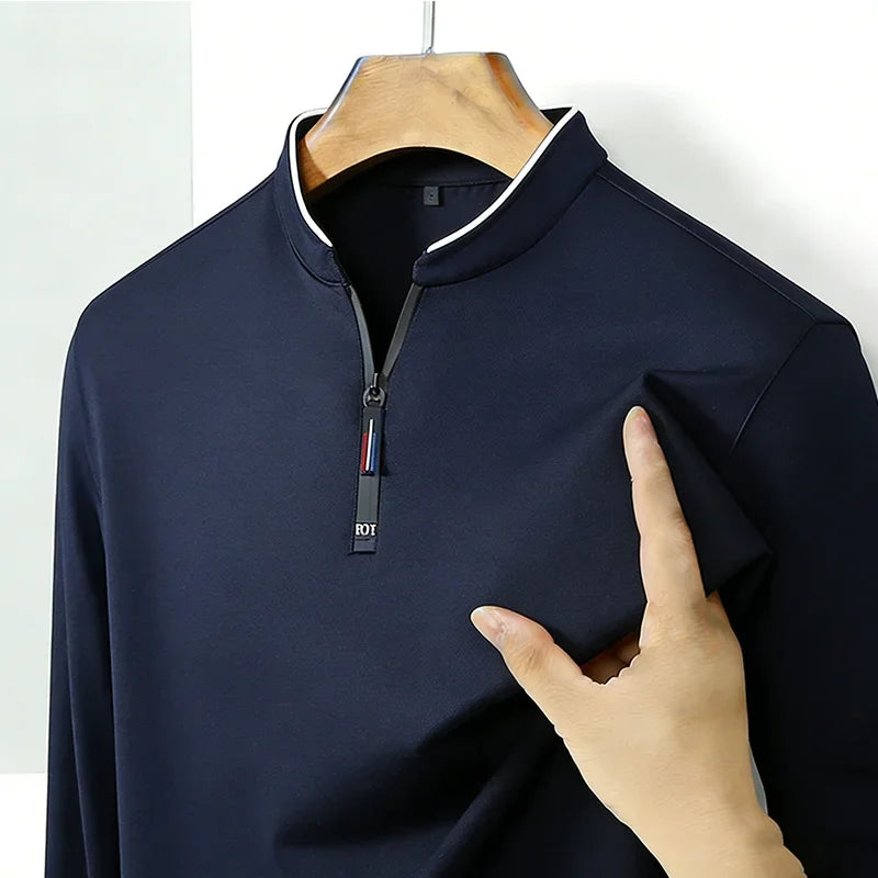 Long-sleeve black men's shirt with half zipper, anti-wrinkle casual style, suitable for business and everyday wear by Corporación Turística.