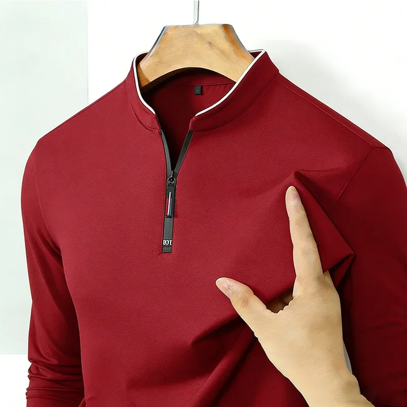 Black men's long-sleeve casual shirt with half zipper, anti-wrinkle fabric, suitable for business or everyday wear by Corporación Turística.