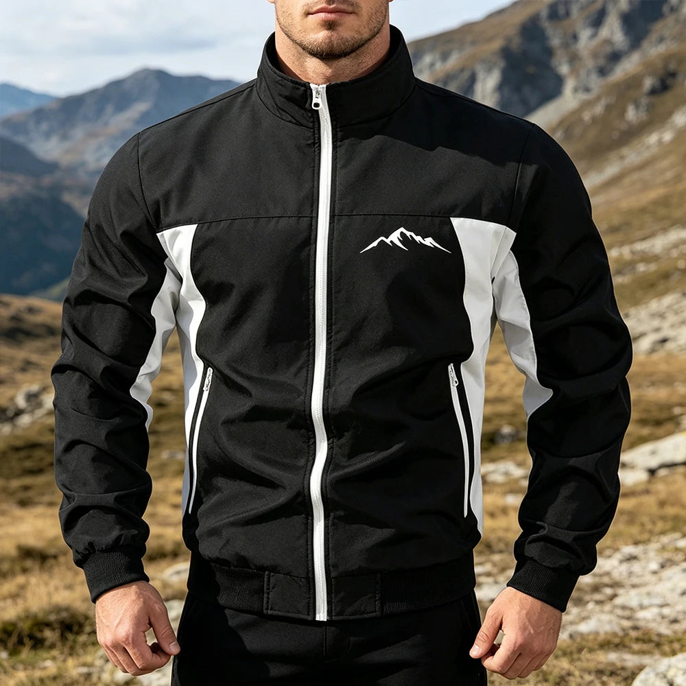 Navy and green men's windbreaker jacket by Corporación Turística, outdoor mountain style, suitable for urban, gym, and running activities.