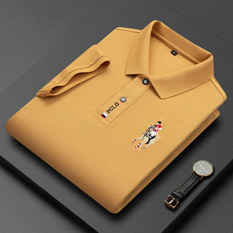 Men's embroidered cotton polo shirt in 4XL by Corporación Turística, casual and breathable, shown in a close-up image.