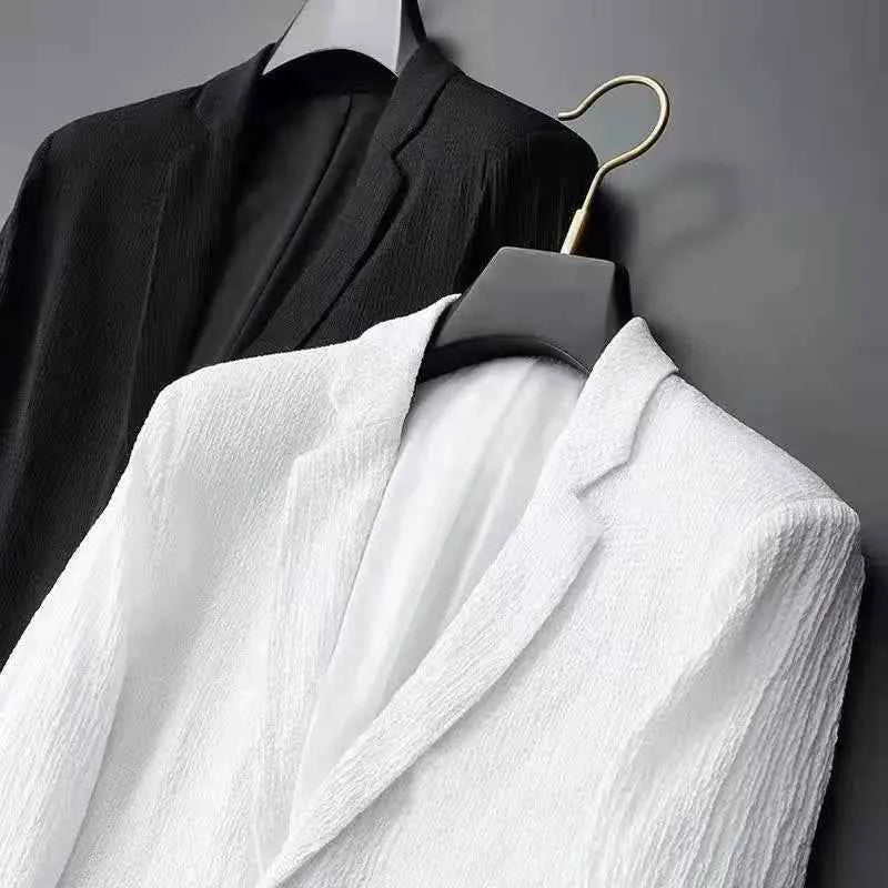 Lightweight, wrinkle-resistant white men's two-piece casual suit by Corporación Turística, perfect for stylish and comfortable wear.