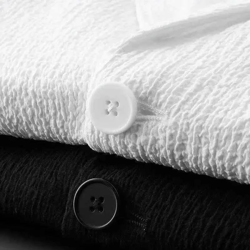 Lightweight, wrinkle-resistant men's casual 2-piece suit by Corporación Turística, white fabric, tailored fit.