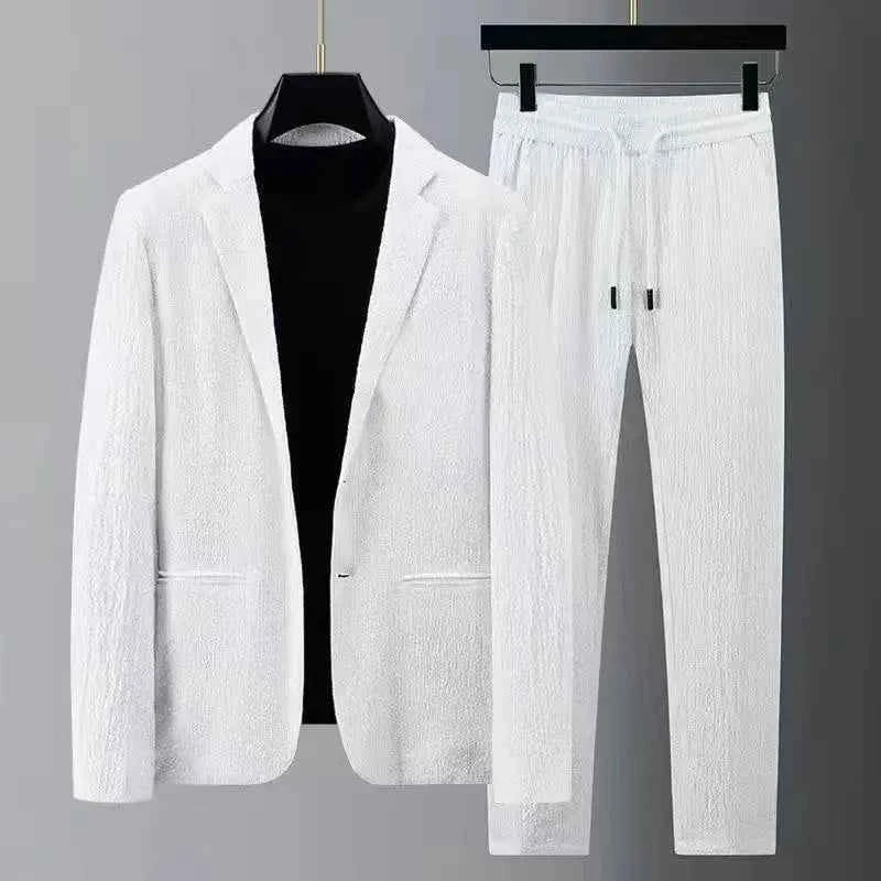 Lightweight, wrinkle-resistant 2-piece casual suit for men by Corporación Turística, shown in white with a modern fit.