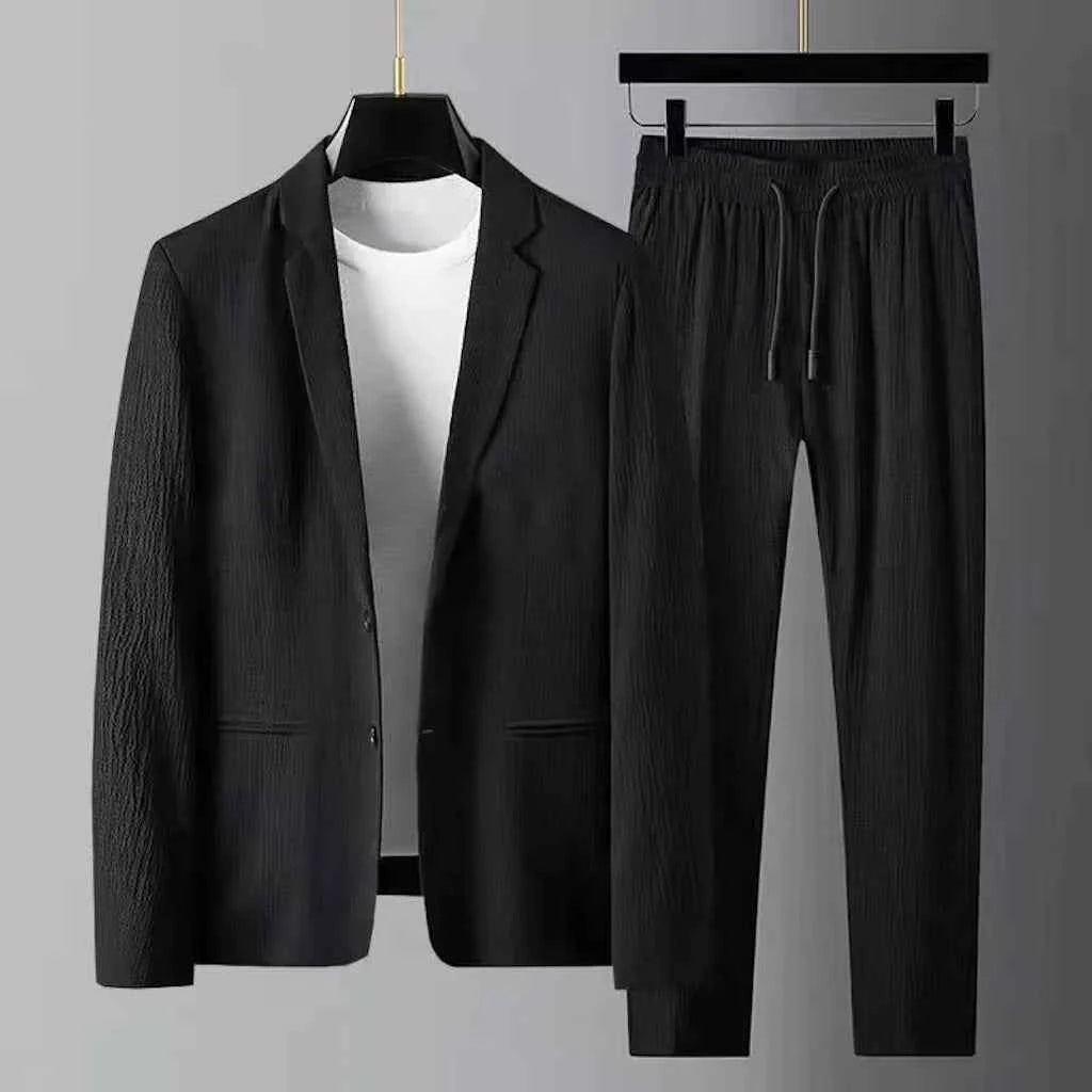 Lightweight, wrinkle-resistant white 2-piece men's casual suit by Corporación Turística, perfect for stylish, comfortable wear.