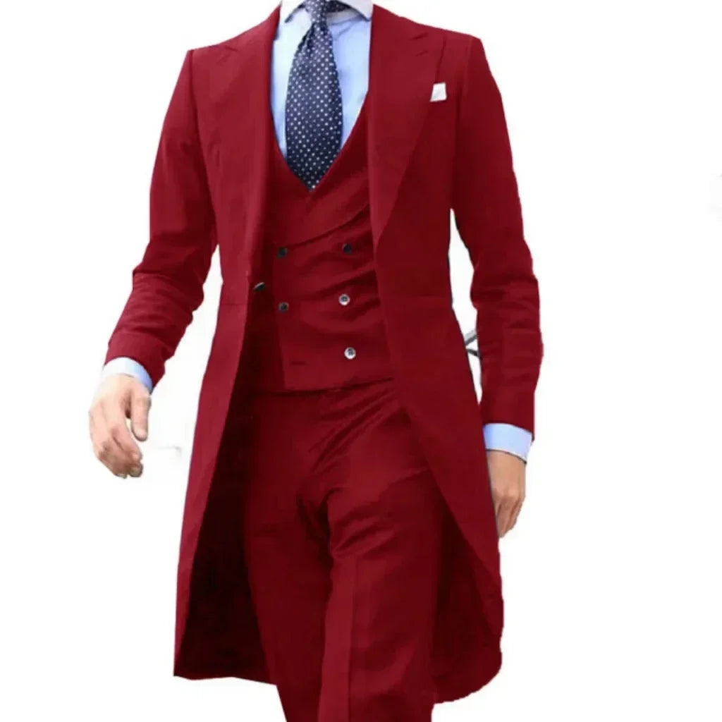 Wine red men's 3-piece formal suit with peak lapel and long tail from Corporación Turística, suitable for elegant occasions.