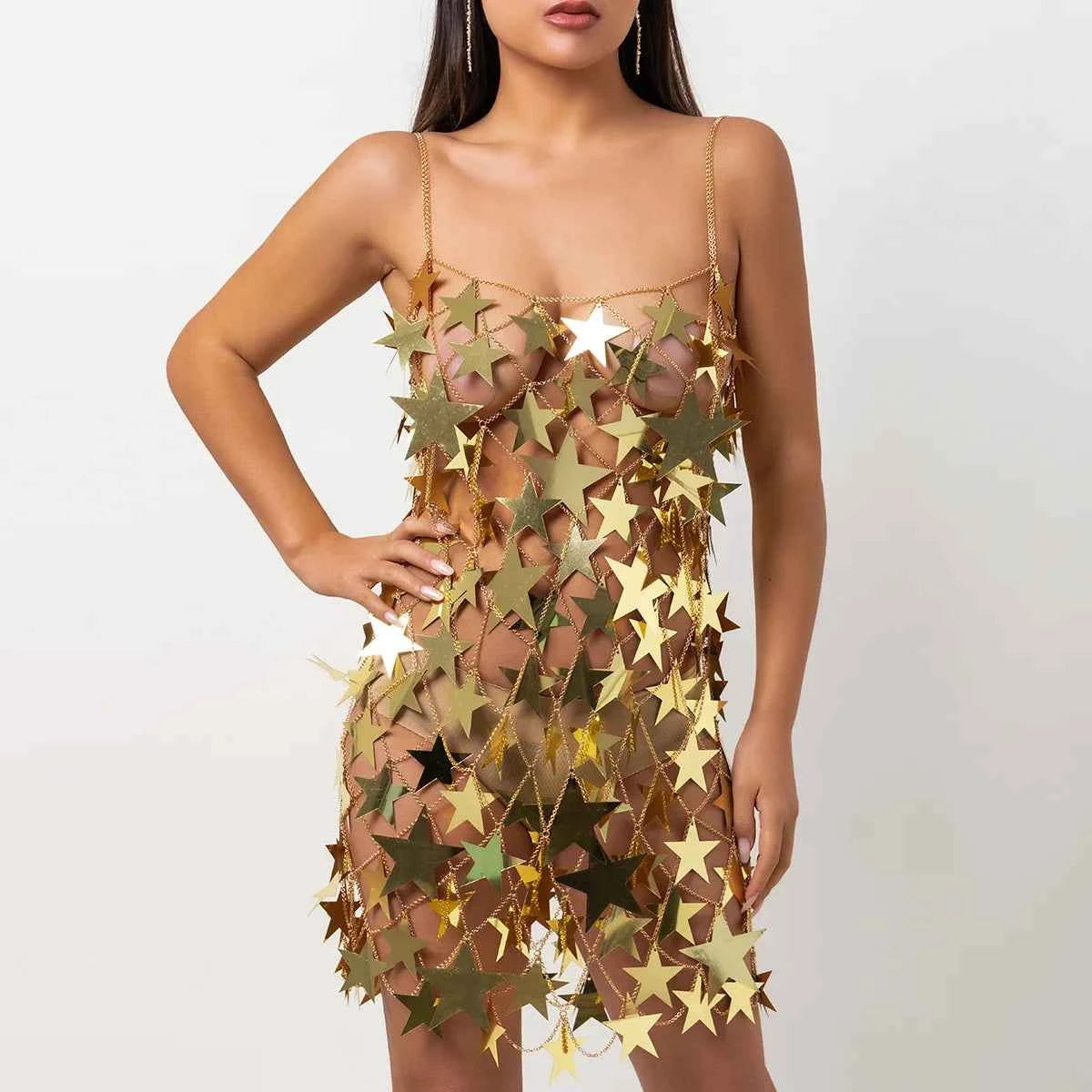 Sexy black mini dress by Corporación Turística featuring a shimmering gold skirt, perfect for festive parties.