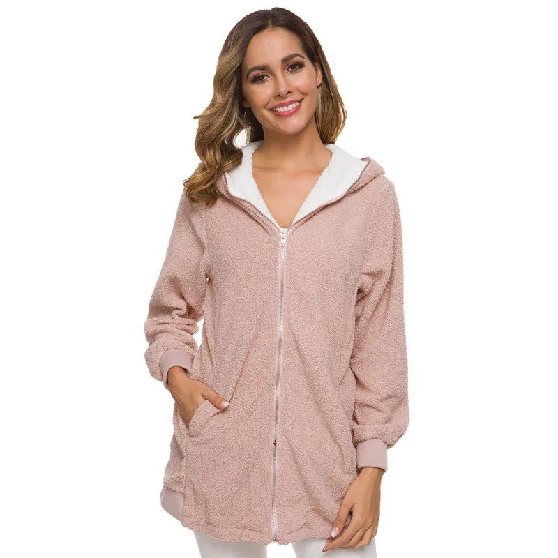 Pink women's cardigan jacket made of synthetic leather and jersey, featuring a stylish, cozy design by Corporación Turística.
