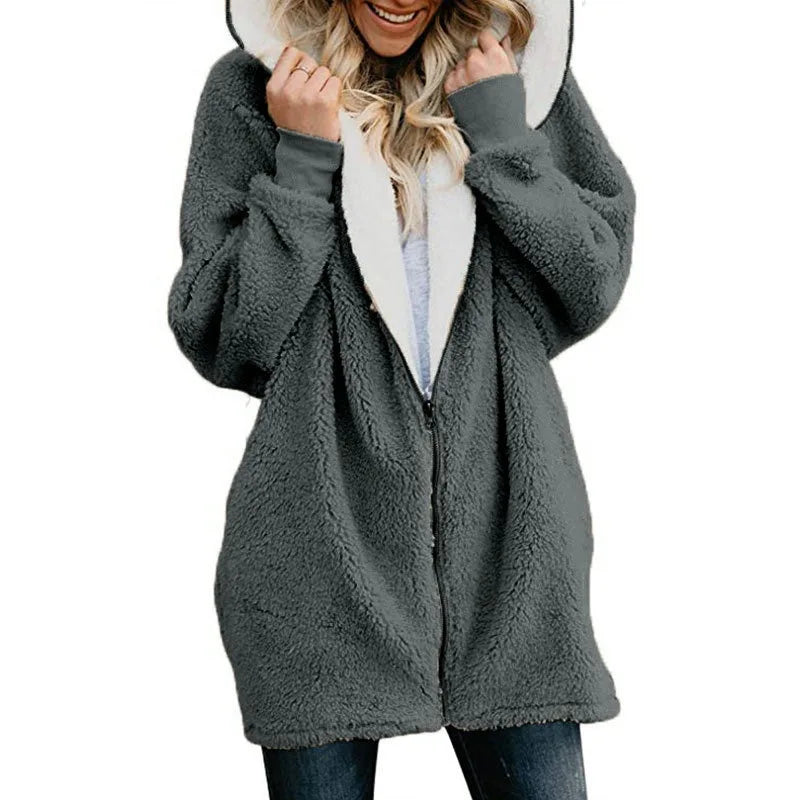 Pink women's cardigan with synthetic leather jacket and jersey details, featuring a cozy, stylish design.
