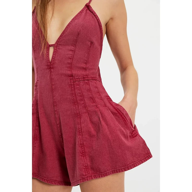 Pink retro Y2K denim short jumpsuit for women with cut-out detail, casual summer style, by Corporación Turística.