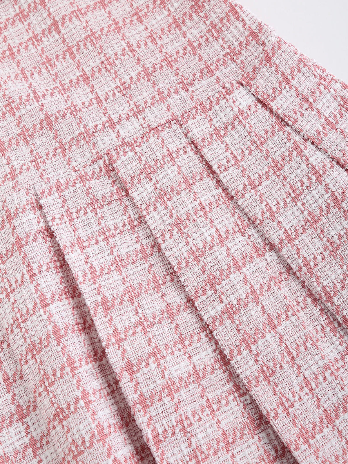 Pink plaid minidress for women by Corporación Turística with short sleeves and waist belt, casual and stylish.