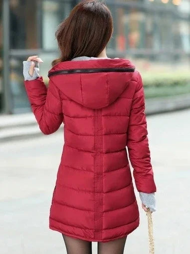 Rose-red women's casual waterproof cotton jacket by Corporación Turística, suitable for fall weather.