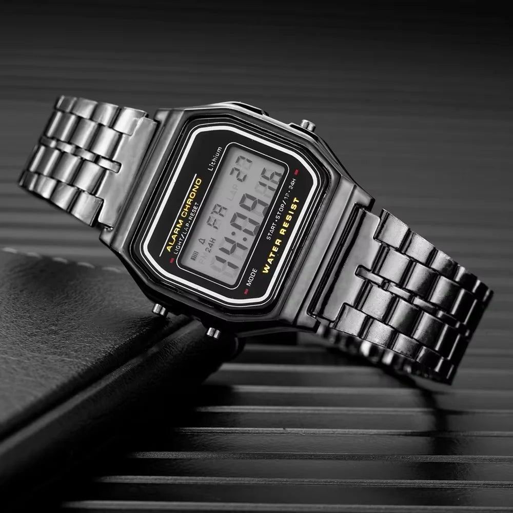Small square LED electronic watch with stainless steel strap from Corporación Turística, featuring a modern digital display.