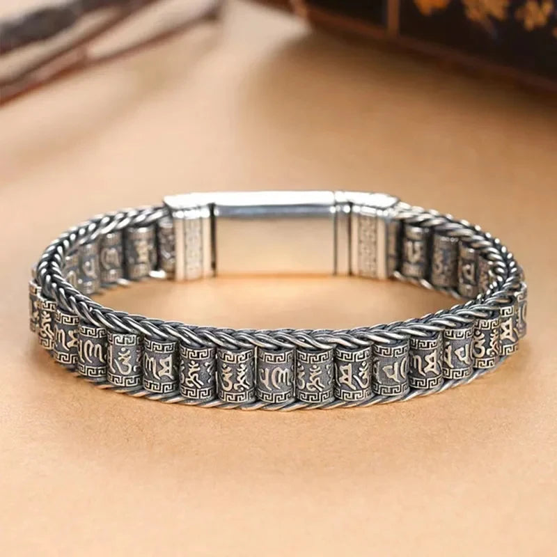 Tibetan Buddhist bracelet with six-character proverbs, 20cm rotatable string, by Corporación Turística featuring traditional symbols.