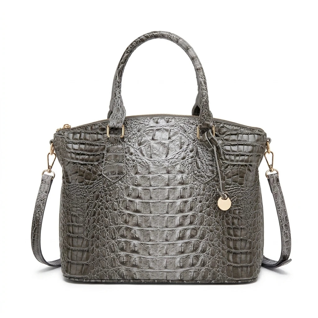 Royal blue and magenta tote bag with embossed design for women, featuring a convertible, stylish carry option.