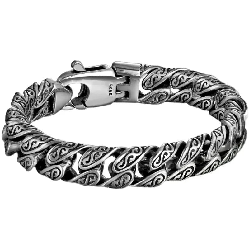 Vintage silver bracelet featuring Tang dynasty-inspired grass design, designed for the shoulder from Corporación Turística.