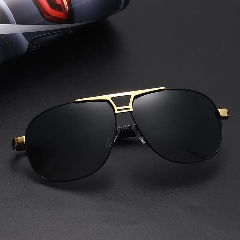 Polarized square sunglasses for men with silver and black frame by Corporación Turística, close-up view of the stylish design