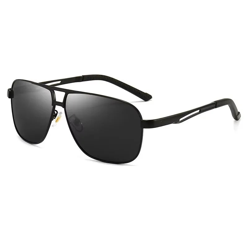 Polarized square sunglasses for men with silver and black frame by Corporación Turística, showing the stylish eyewear on a plain background.